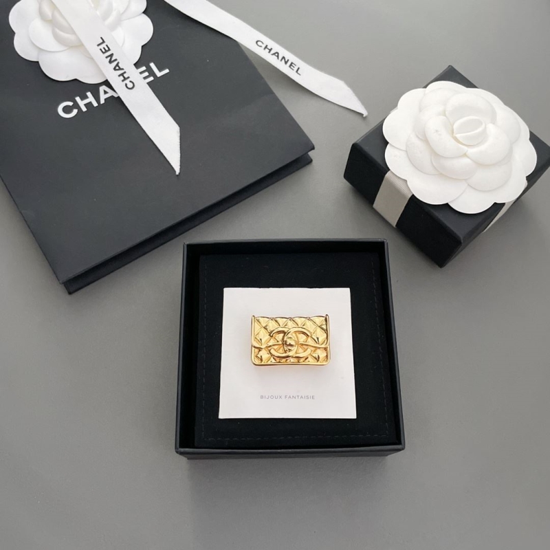 Ch*el brooches